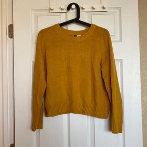 Yellow knitted sweater